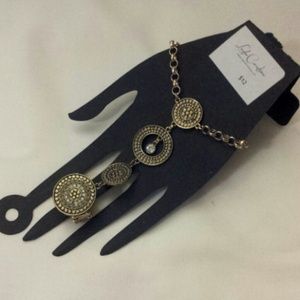 brass color ring bracelet