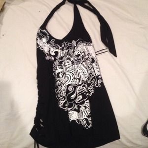 A black top with a neck strap