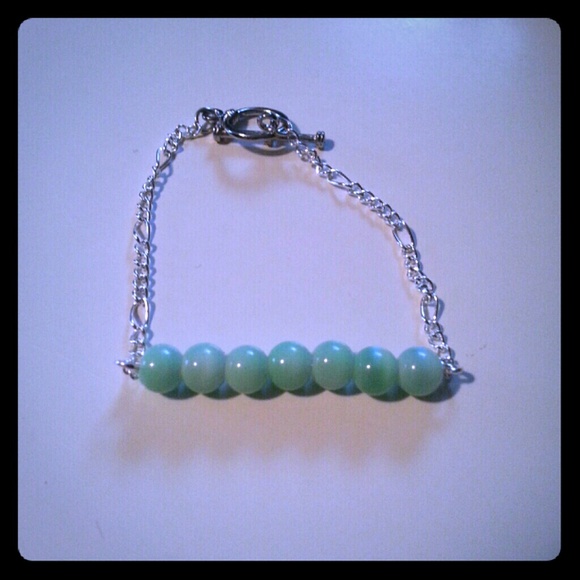 Pastel green beaded bracelet.