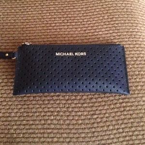 Michael Kors perforated wristlet