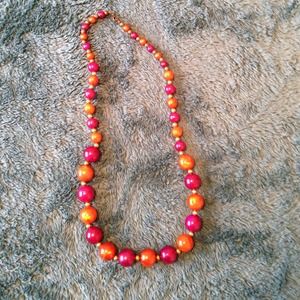 Pink orange and gold graduated bead necklace