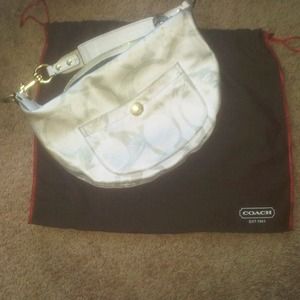 Medium sized White coach hobo with silver logo