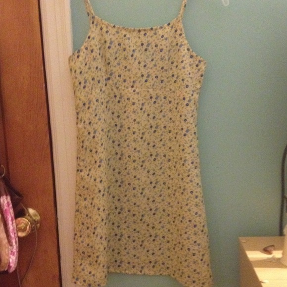 A yellow with blue flowers, sheer dress. 💐