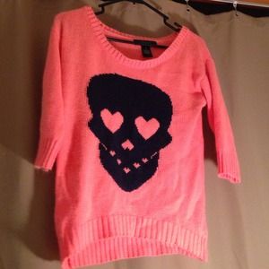Pink sweater with black skull