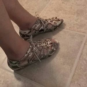 Awesome !!Snakeskin tie up shoes.
