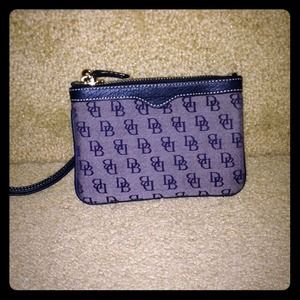 DB navy wristlet with gold accents