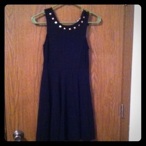 Short black dress with stud detail
