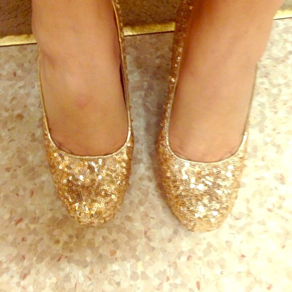 Gold high heels