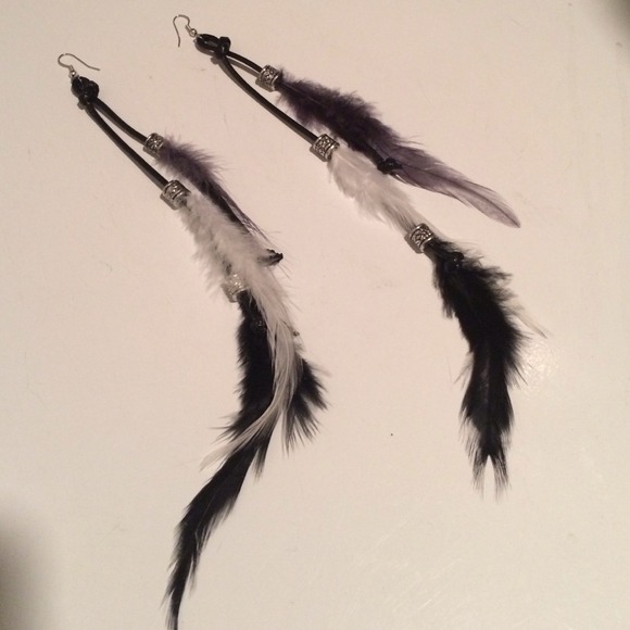 Feather earrings with silver beads
