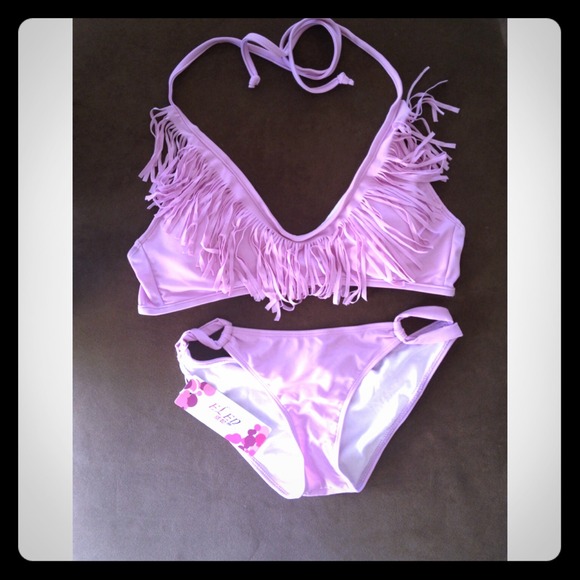 A medium, NWT, light purple bikini.