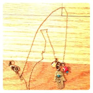 Hand and evil eye necklace
