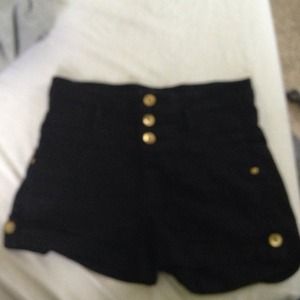 Super cute high rise shorts. Gold detail.