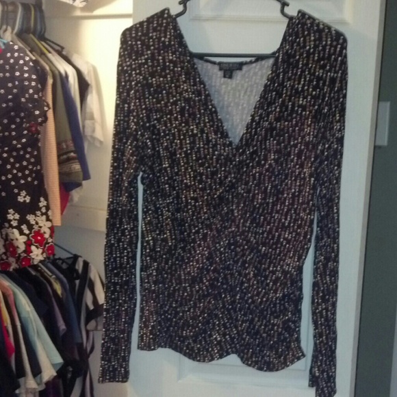 Black, brown, and white long sleeve top