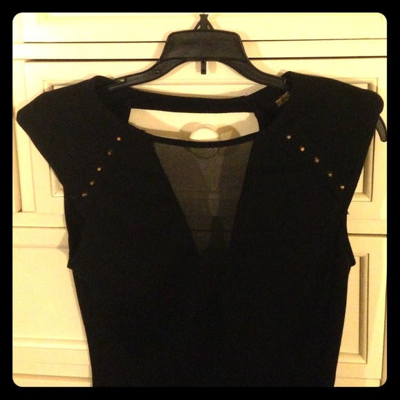⭐️SOLD⭐️Fitted black dress with gold stud accent