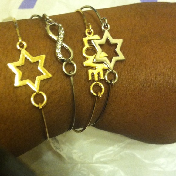 Four Dressy Bracelets 2 Silver 2 Gold.