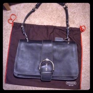 Coach designer purse with strap