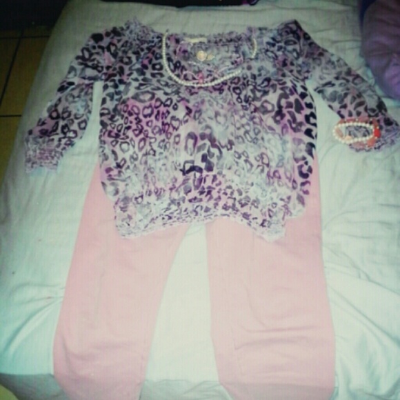 Pink and black cheetah shirt.