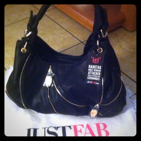 Just fab large bag very nice comes with dust bag