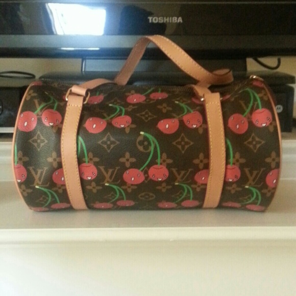 Louis Vuitton purse  w/ lock and key