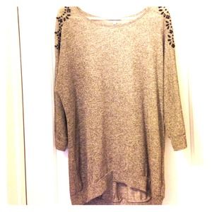 Gray quarter length light sweater with rhinestones
