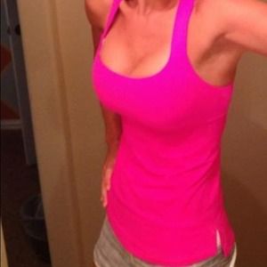 Lululemon pink track and train tank size 4