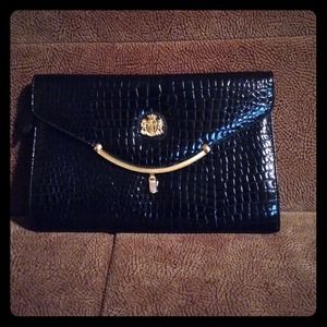 Black clutch with gold details