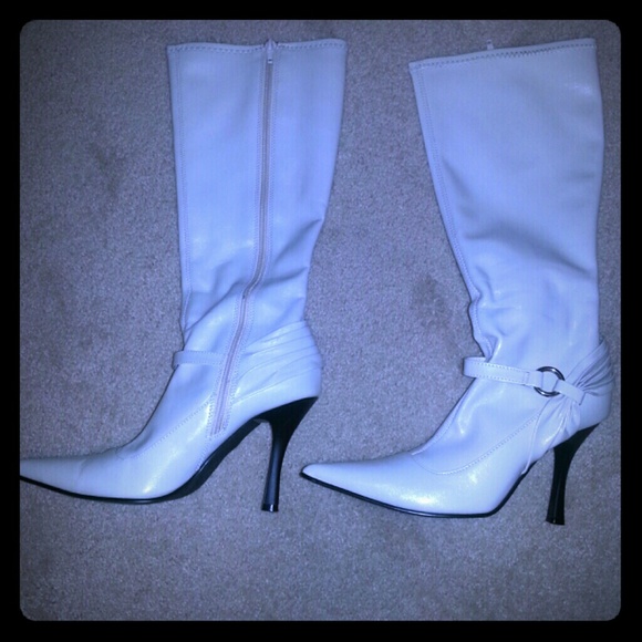 Tall Winter White side zip boots.