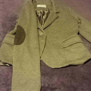 Blazer with elbow pads. Slight tear inside