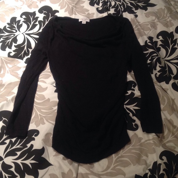 Black long sleeve cowl neck sweater.