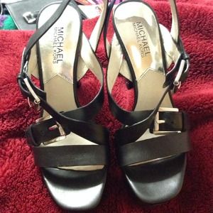 Gently used MICHAEL KORS BLACK PLATFORM size 7.5