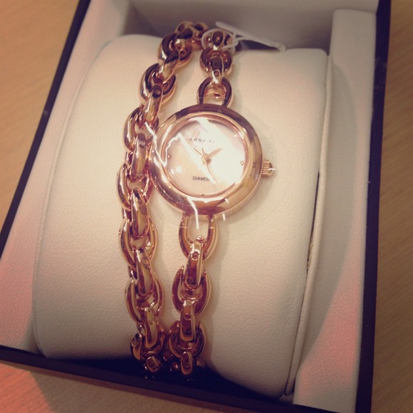 Anne Klien rose gold charm bracelet watch