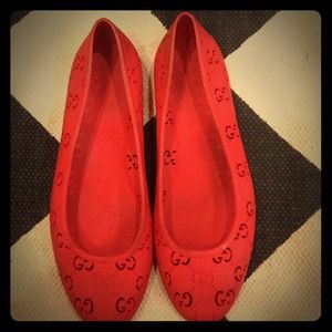 Orange Gucci jelly flats