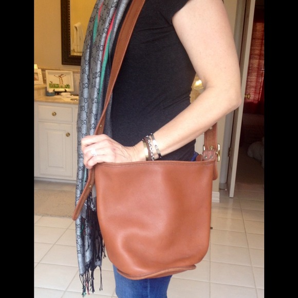 Authentic Coach tan leather bucket style purse.