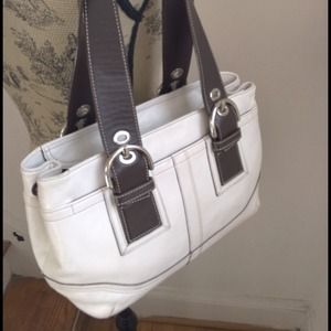 COACH satchel with brown strap