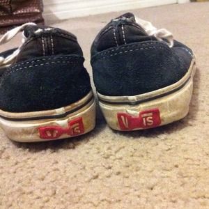 Worn out black vans