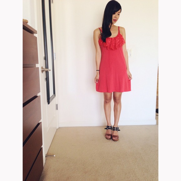 Coral dress with ruffled lace detail