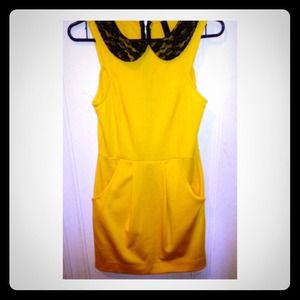 Fitted A-line yellow dress with black lace collar