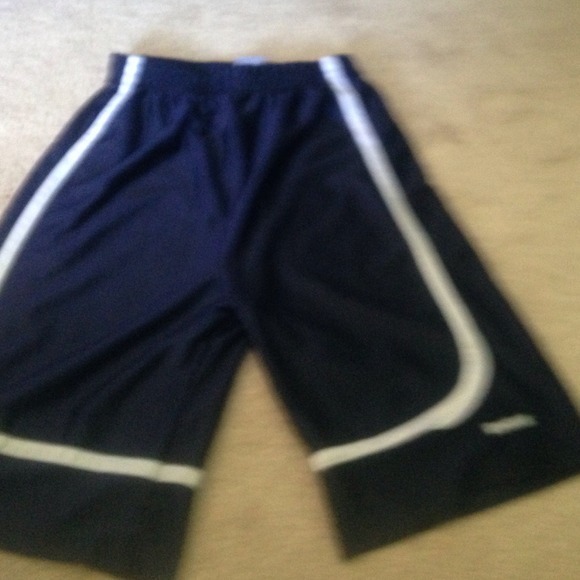 Navy blue and white reebok pants