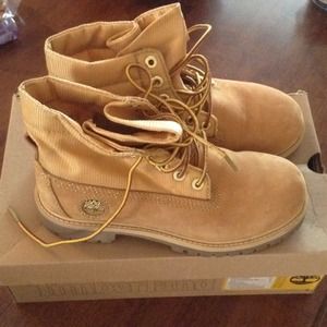 Gold Timberland boots in box. Only worn once