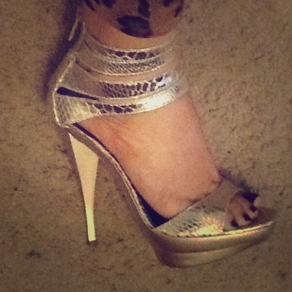 Michael Antonio gold platform heels