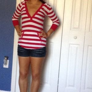 Striped pink and white hoodie shirt.