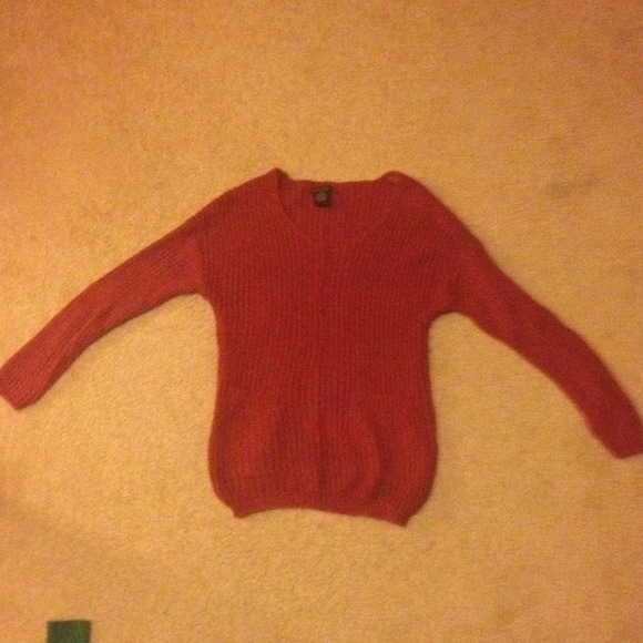 Knit sweater.