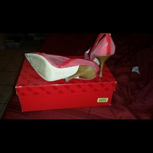 Red high heels in mint condition.
