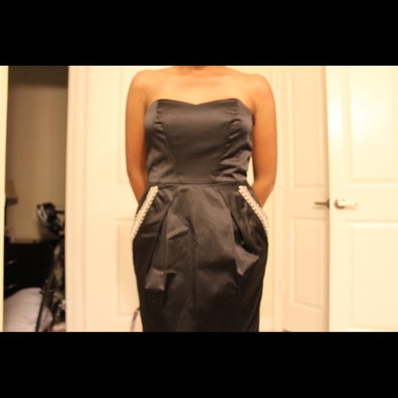 Black satin dress with studded pockets