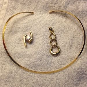 Gold tone cuff necklace with two pedants