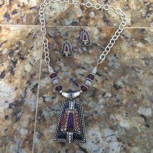 Purple costume jewelry necklace and earring set.