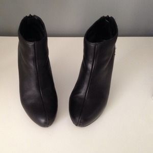Black booties by Report