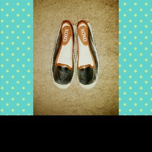 Silver and brown flats