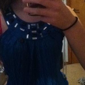 Blue dress up shirt.