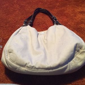 Tan and brown bag with lots of pockets